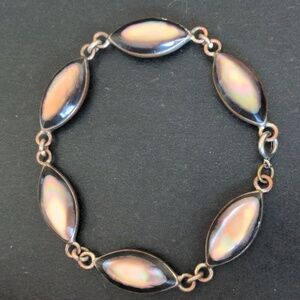 Vintage handmade bracelet w opal like glowing mother of pearl links, 8"